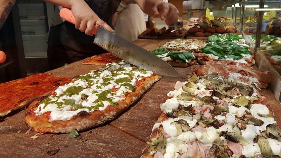 Slicing up Gourmet pizza