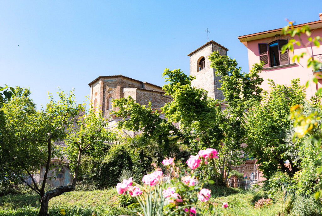 Lush view of a church in Allerona from below