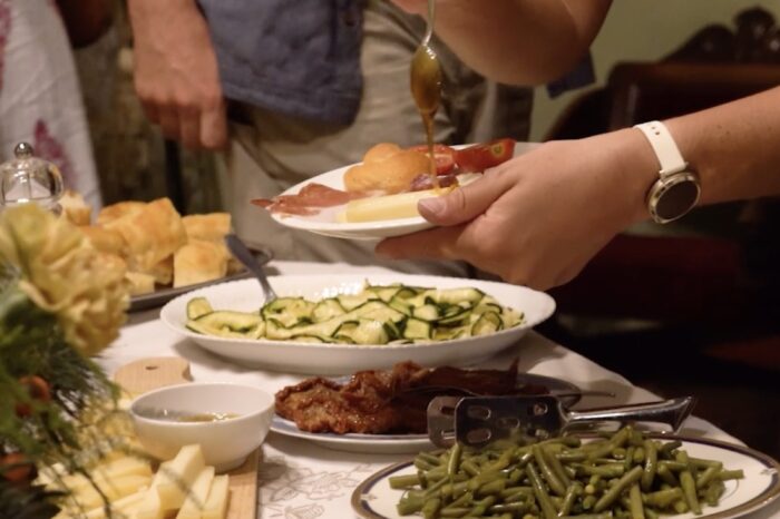 Group meals - hands serving food dinner
