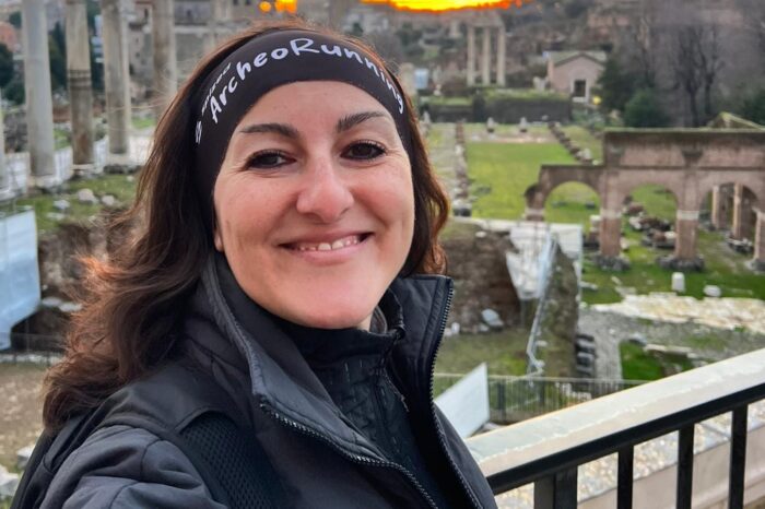Woman taking a selfie at ancient Roman ruins in Rome
