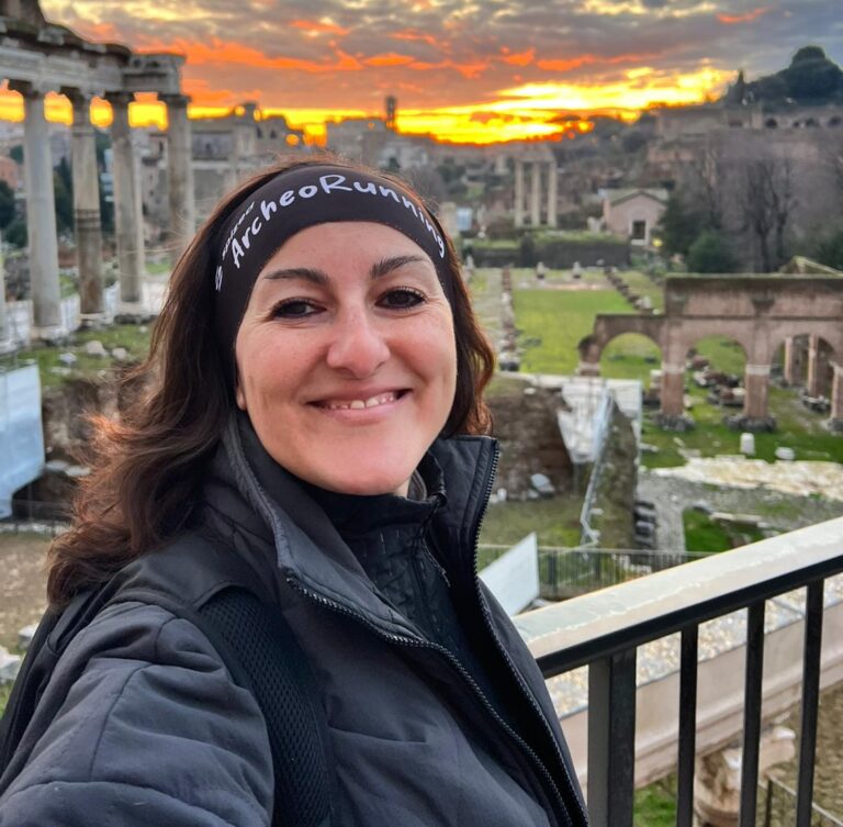 Woman taking a selfie at ancient Roman ruins in Rome