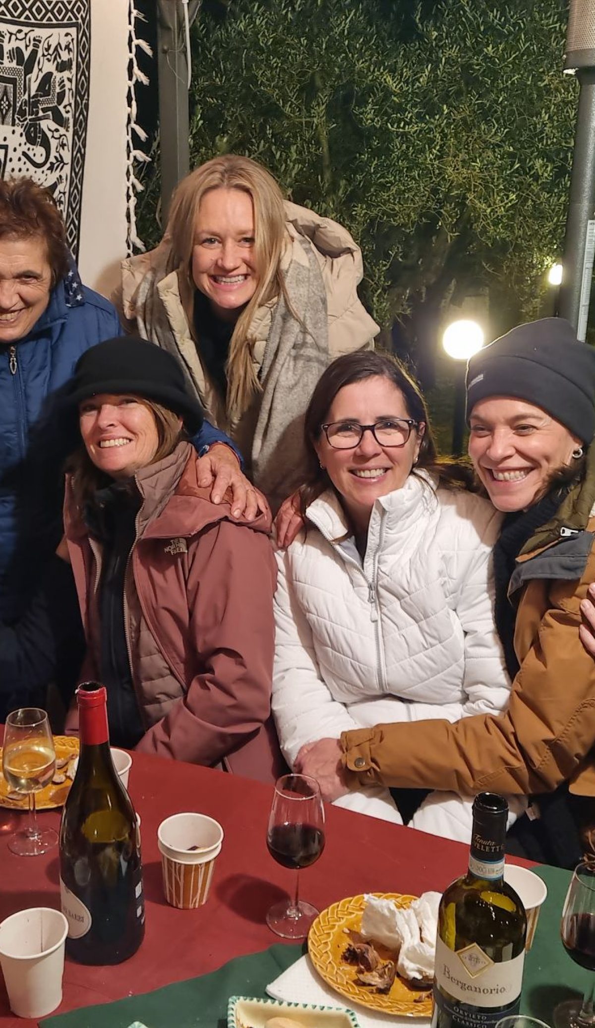 Tour Group Enjoying Wine in A Garden